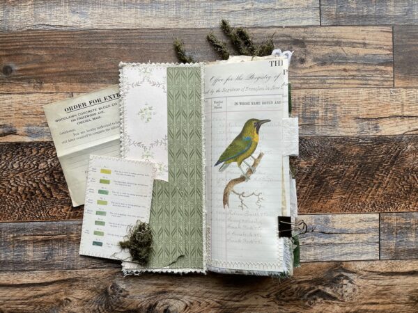 Junk journal spread with green bird