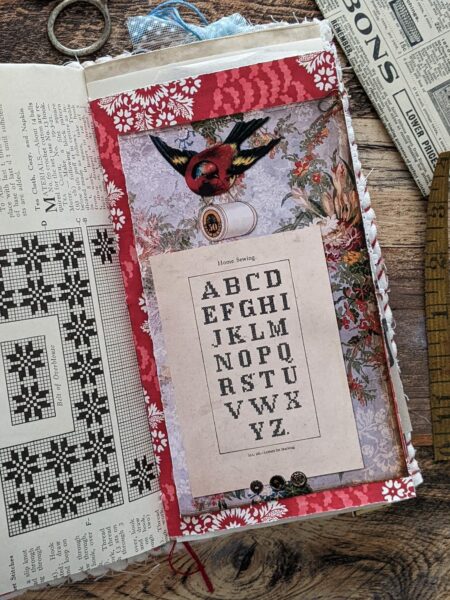 Junk Journal spread with sampler alphabet card