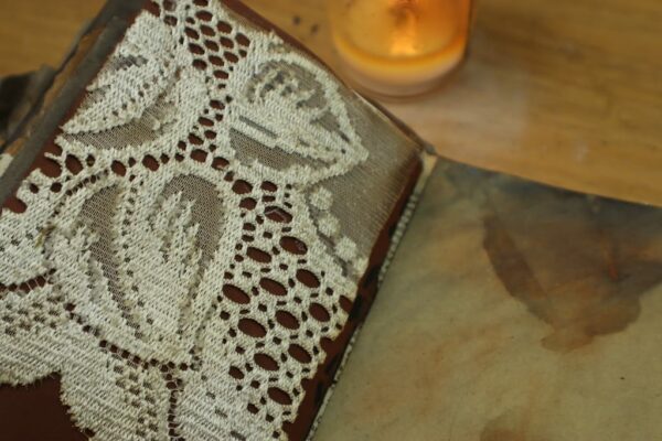 Cream lace on journal page