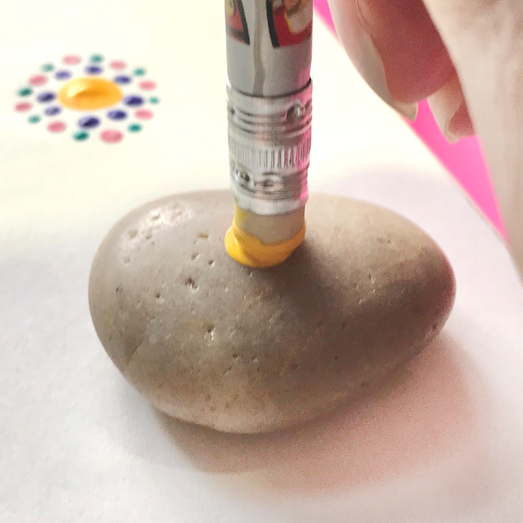 Dab paint on rock perpendicular to surface