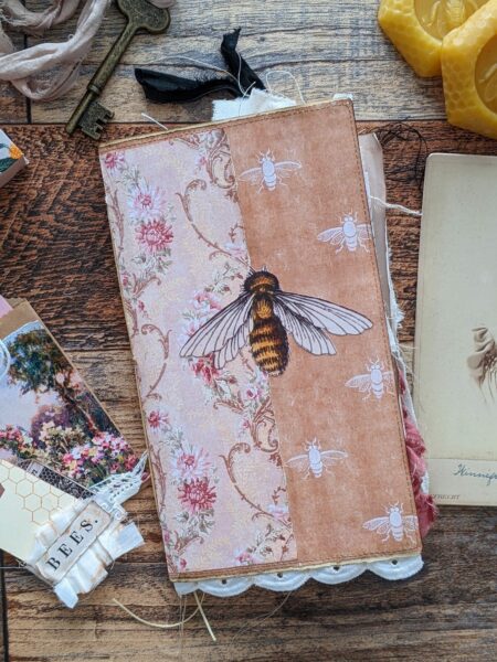 Journal spread with bee image