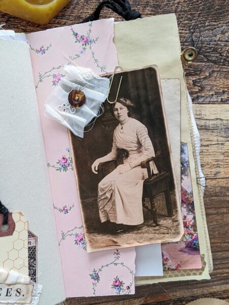 Journal spread with vintage photo of seated woman