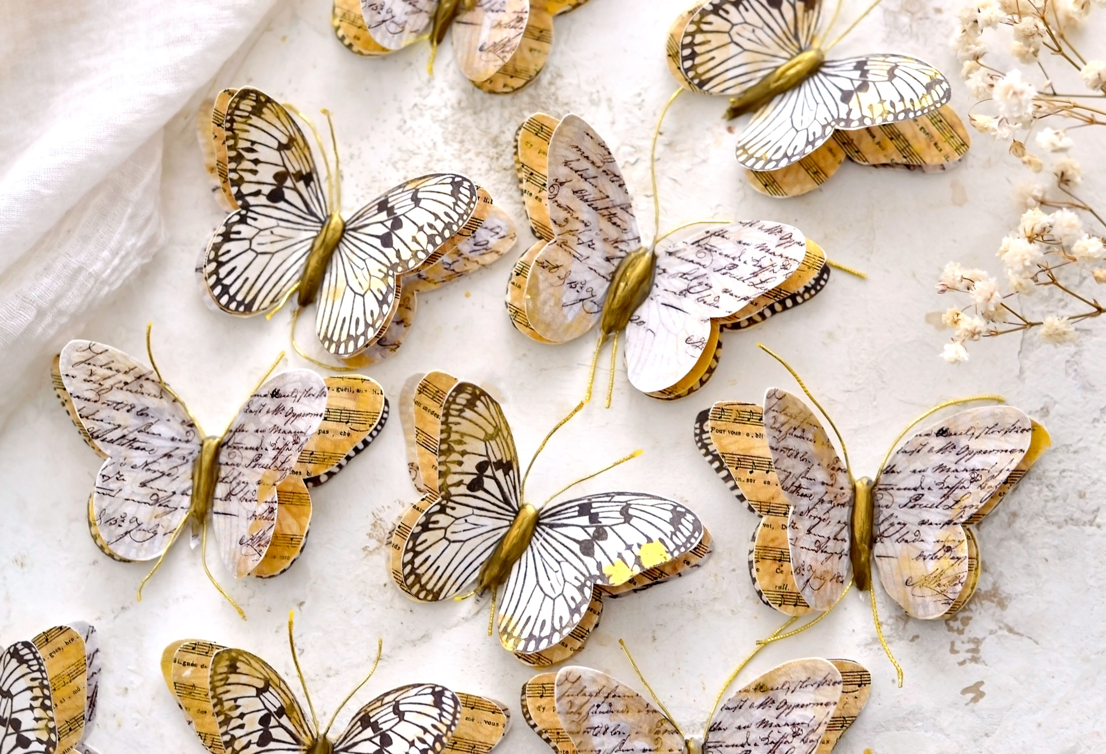 different paper butterflies after drying
