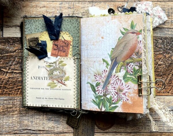 Journal spread with flower and bird image