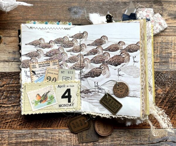 Journal spread with bird flock image