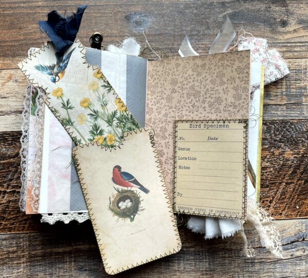 Journal spread with bird pocket