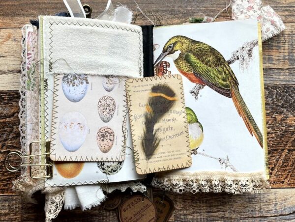 Journal spread with feather sticker