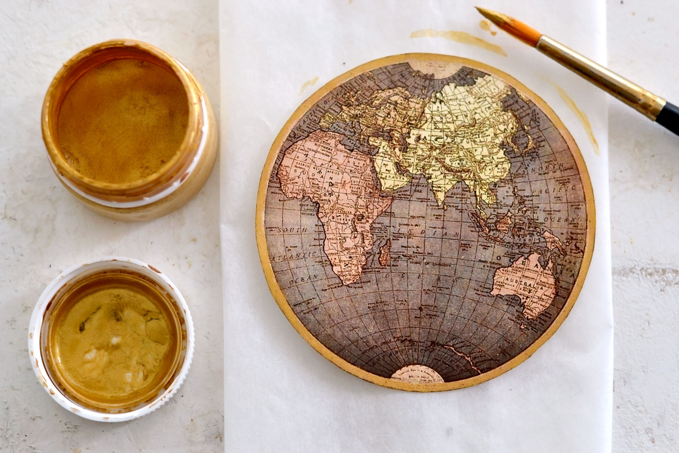 gilding the brown globe map