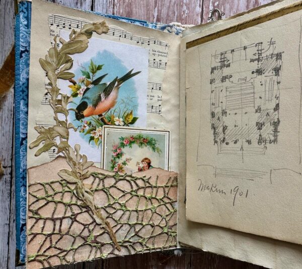 Journal spread with music paper and bird image