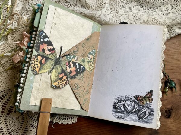 Large butterfly belly band on journal page