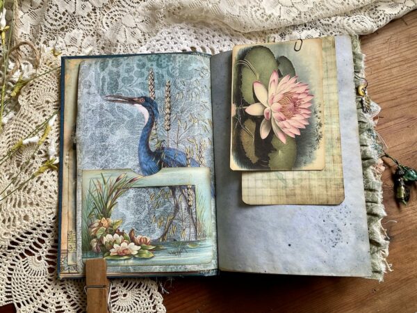 Journal spread with heron and lily.