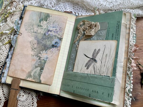 Dragon fly card in journal pocket and music paper page