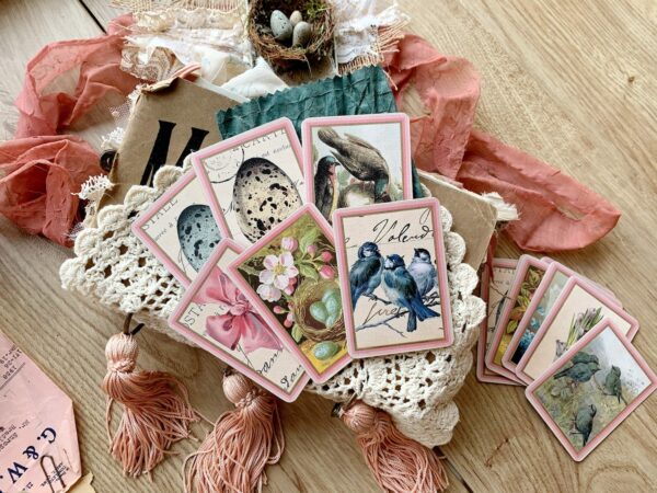 Decorated playig cards wih bird images