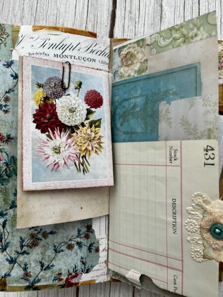 Journal spread with vintage flower seed packet