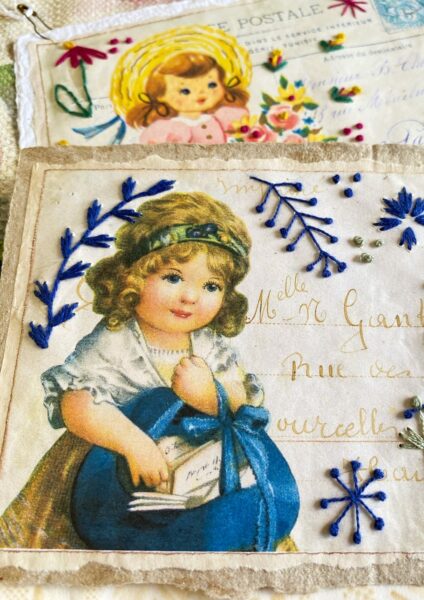 Close up of embroidered postcard