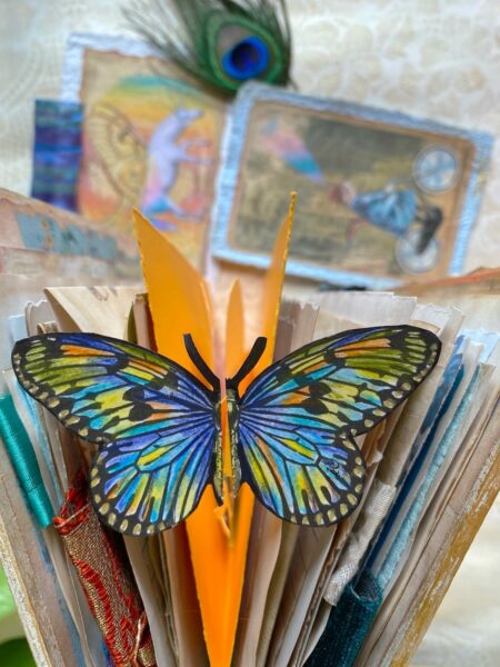 Butterfly bookmark on a journal page