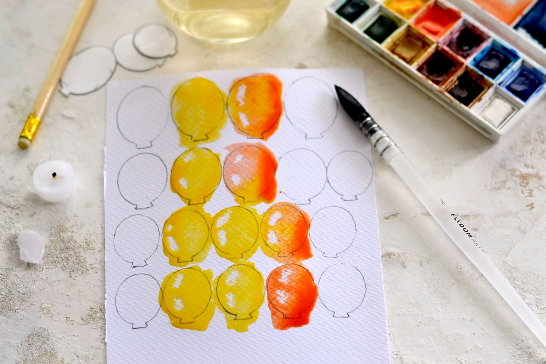 painting the balloons with watercolors