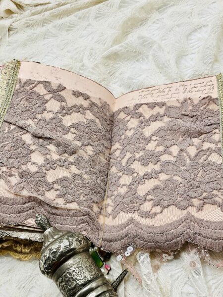 Lace panel on pink journal page