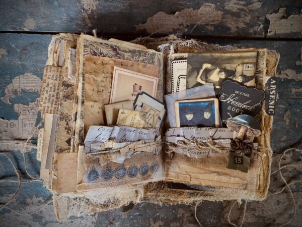 Junk journal spread with pockets of old photos
