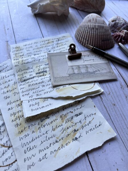 Handwritten documents with coffee cup stains