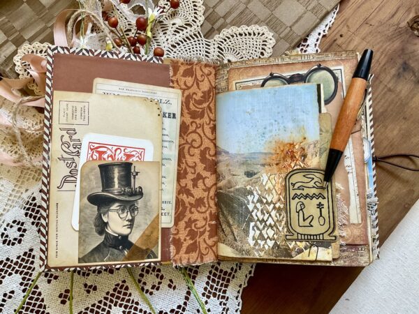 Journal spread with tuck spot and explorer photo