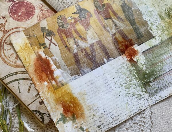 Journal page with egyptian images and dyed papers