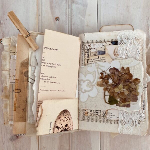 Journal spreda with dried flowers