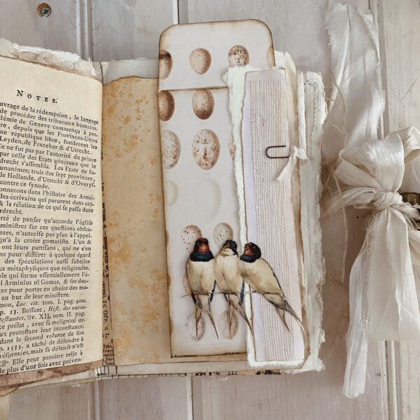 Journal page with three swallows