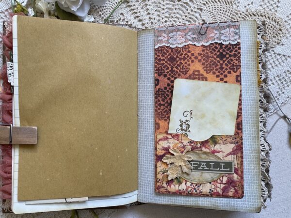 Journal page withautumn leaves and a label 