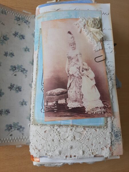 Journal spread with sepia photo and lace pocket