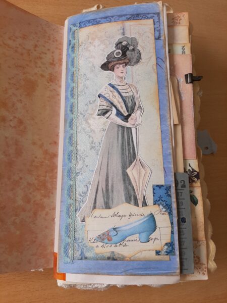 Journal page with elegant lady image and blue lace trim