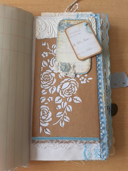 Journal page with tags and white floral print