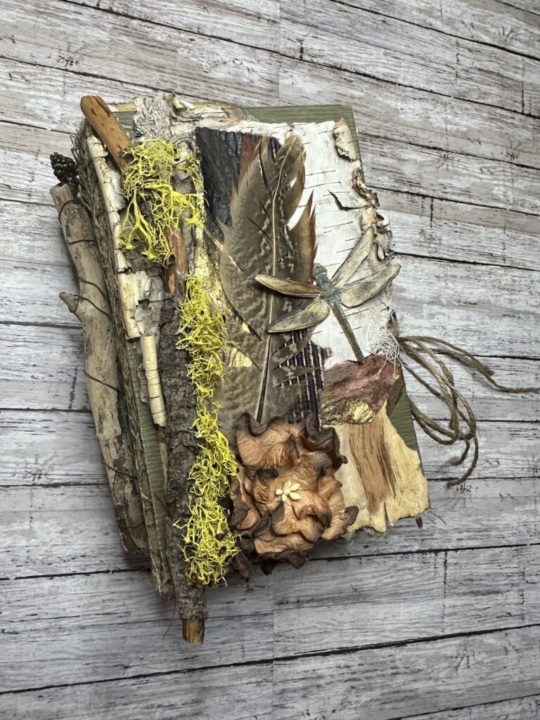 Junk journal cover with tree bark and dragon fly