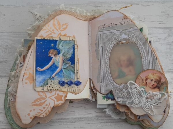 Junk journal spread with blue angel image