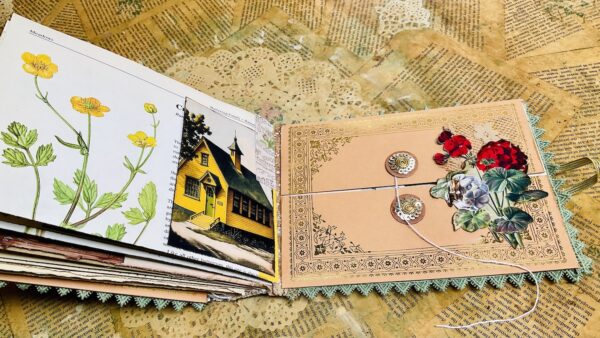 Journal spread with yellow cottage and flower images
