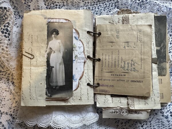 Journal page with pocket and old photo of woman