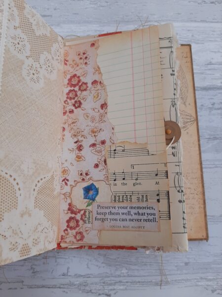 Journal spread with floral print and music paper