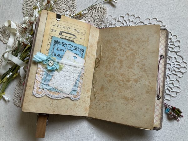 Journal apge with blouse pin image
