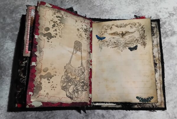 Journal spread with coffee dyed paper and stamped images