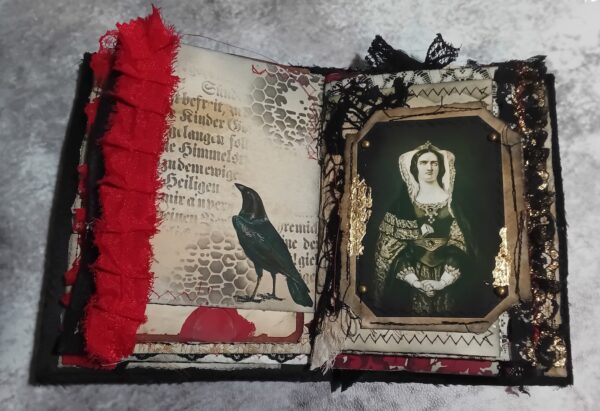 Journal spread with woman image and raven bird