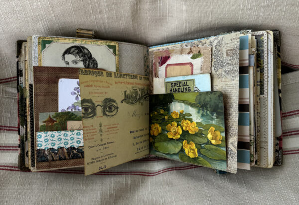 Journal spread with yellow flowered card