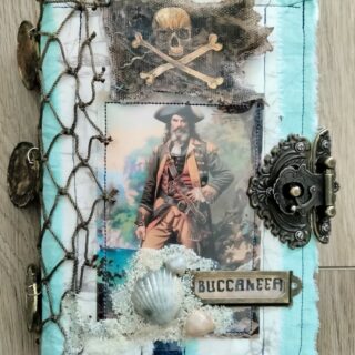 Journal cover with pirate image and fish net spine