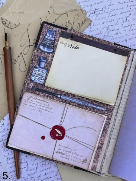 Inside cover of junk journal with notepad