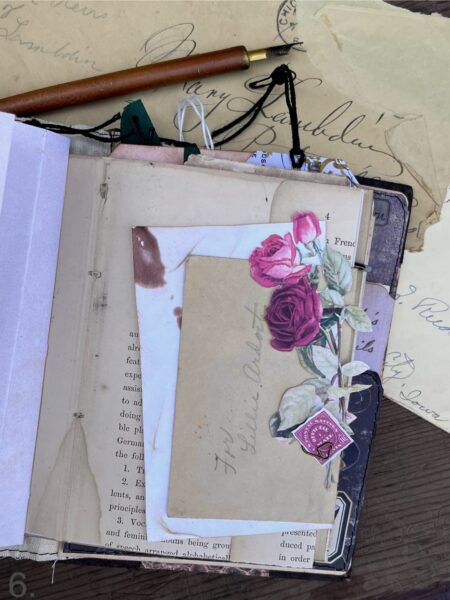 Journal page with rose print and envelopes