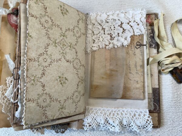 Journal spread with lace pocket