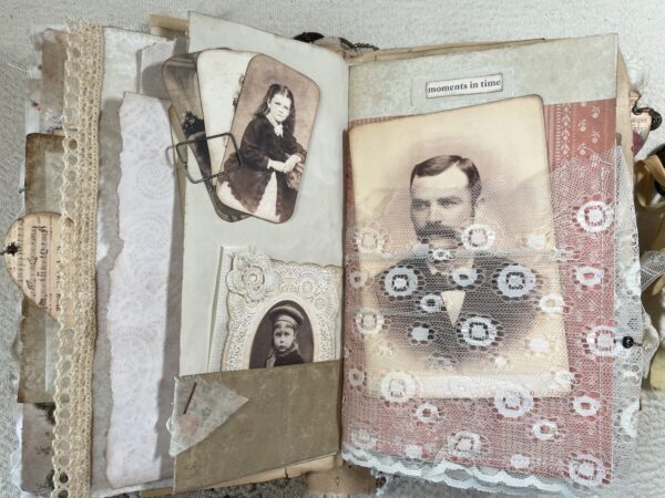 Journal spread with pocket holding sepia photos