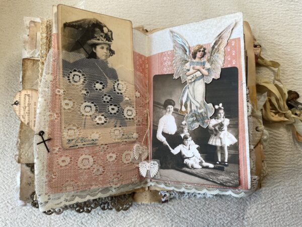 Journal spread with sepia photos and lace panel