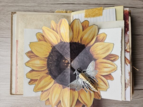 Journal spread with pop up sunflower image