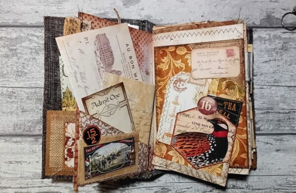 Journal spread with pockets and vintage tickets