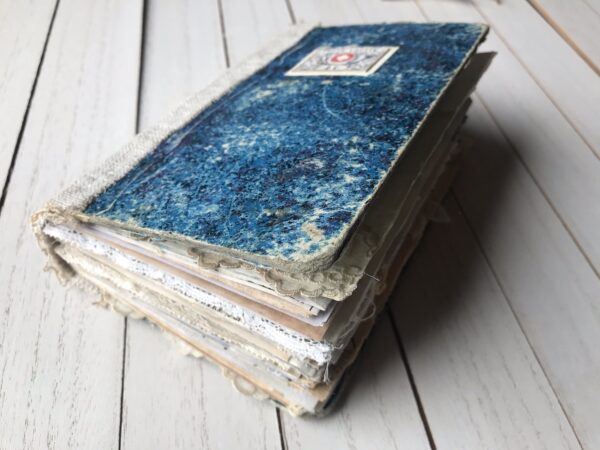 Side view of journal with blue cover